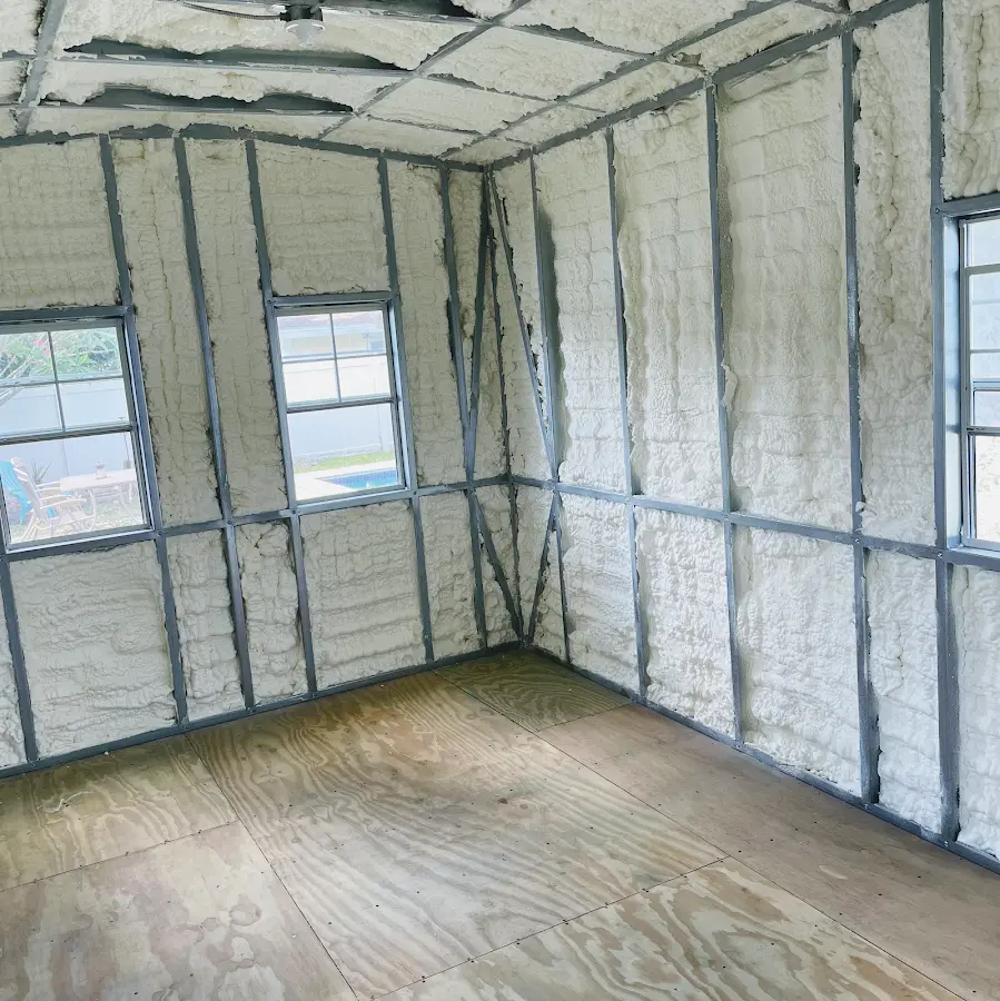 Closed-cell spray foam insulation applied to wall cavities in a residential project in Yonkers